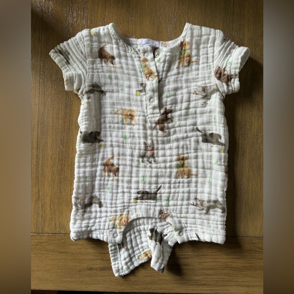 Size 3-6 month baby muslin Henley romper by Angel Dear. “Pastel puppies” print.